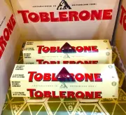 12 Packs Toblerone Swiss Milk Chocolate with Honey & Almond 3.52oz/100g Each