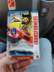 Hot Wheels 2024 Transformers Bugatti Veyron HTF RARE LOOK in hand