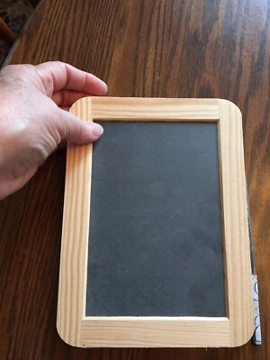 slate board with wooden frame.. Two sided slate. 7.5 x 5.5 in.