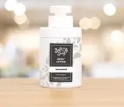 Buff City Soap. Body lotion. Sandalwood, Patchouli, & Magnolia.