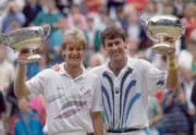 Anders Jarryd of Sweden and John Fitzgerald of Australia lift the - Old Photo
