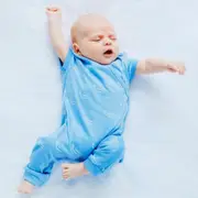 Organic Cotton Summer Short Sleeve Crossover Sleepsuit - Tiny Whales in Hydrangea Blue