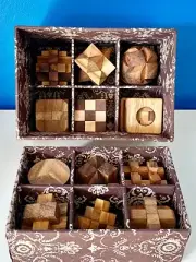 12 Puzzle Brain teaser interlocking wooden Puzzle set in a Deluxe Gift Box