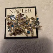 Napier New Gold Tone Two Starfish Pin with Clear & Colored Stones