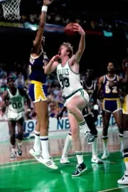 Larry Bird Boston Celtics goes up for a shot v Kareem Abdul Jabbar- Old Photo