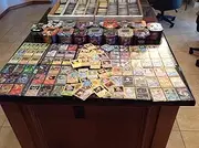 150 Assorted Pokemon Card Lot with Foils. Collector's Tin Included