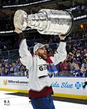 Devon Toews Avalanche Unsigned 2022 Stanley Cup Champs Raising Cup Photo