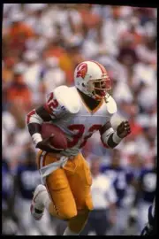 Running back Errict Rhett Tampa Bay Buccaneers carries the foot- 1995 Old Photo
