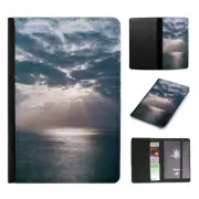 PASSPORT ITINERARY ORGANIZER|SUN BEHIND GLOOMY CLOUDY SKIES
