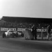 Lucien Bianchi ENB Emeryson-Maserati leads Olivier Gendebien Emery- 1961 Photo 1