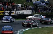 Joachim Winkelhock BMW 318i spins out of contention at Druids Hair- Old Photo