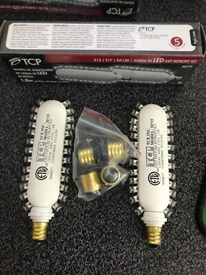 TCP 20719 2 WHITE LED EXIT RETROFIT LAMPS WITH 4 BASE ADAPTERS. E12 - E17 - BA15