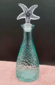 Ocean Themed Pebbled Glass Bottle with Clear Starfish Stopper