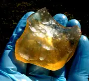 Libyan Desert Glass Meteorite Tektite impact specimen( 250 crt) Flat Dimples Gem