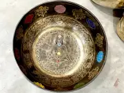 Handmade Himalayan Singing Bowl with Meditating Yogi & Root Chakra Colors -
