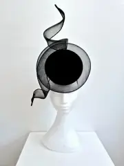 Miss Duke. Womens Black percher headband fascinator with crinoline swirl