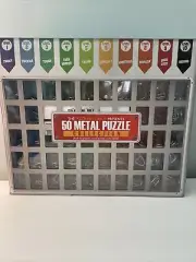 The Puzzlers Guide Set of 50 Metal Puzzles Brainteasers Collection NIB