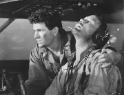 Joe Winocki tries to rouse the pilot in Air Force 1943 Movie Film Old Photo
