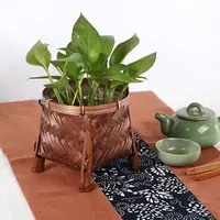 在飛比找樂天市場購物網優惠-中式復古竹籃 帶腳架綠蘿花盆竹簍 茶道收納桶 創意花器