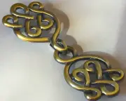 Celtic cloak clasp in gold metal. this is a sew on style.