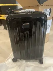Tumi International Expandable 4 wheeled Carry-on 22" Hard side Black