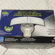 New in box! Home Zone Dual Head EXT Security LED Light with Motion Activated