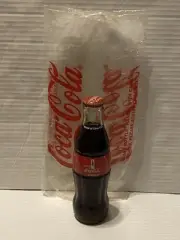 World of Coca-Cola 8fl oz. 2013 bottle unopened