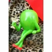 Michael Godard Olive Key ring with Pimento holding a Martini Glass