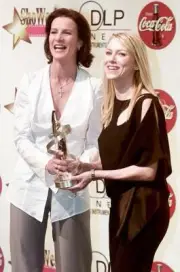 Actresses Rachel Griffiths and Naomi Watts arrive at the ShoWest a - Old Photo