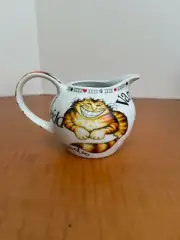 Alice in Wonderland Creamer made of porcelain