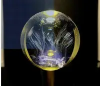 在飛比找Yahoo!奇摩拍賣優惠-幸運星 天然阿賽斯特萊 55m全淨體黃金藍針黃水晶球b 原礦