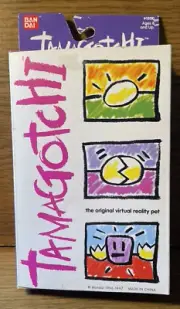 1996 Ban Dai Tamagotchi The Original Virtual Reality Pet Orange New in Box