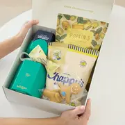 Christmas Treat Gift box jam packed with Chocolate and sweat treats. Same day delivery by Edible Blooms