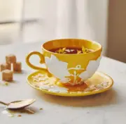 Anthropologie Luciana Stoneware Cup and Saucer Yellow Floral Textured NEW