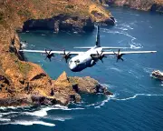 LOCKHEED MARTIN C-130-J HERCULES NEAR SANTA CRUZ ISLAND - 8X10 PHOTO (EP-585)
