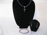 Amethyst gem stone beaded pendant, matching bracelet, and earrings.