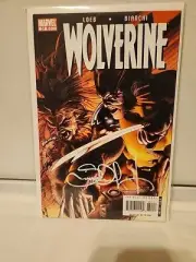 Wolverine #51 signed W/ Certificate by Simone Bianchi Wolverine vs. Sabertooth.