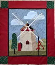 Betsey Bates appliqued windmill wall hanging with embroidered accents