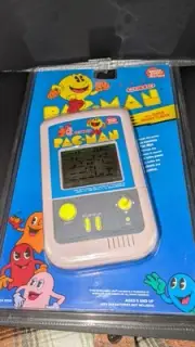 Micro Games of America PAC-MAN Sealed Mint Hand-Held Game - 1992. Light Grey.