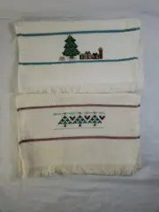 TWO COMPLETED CROSS STITCH CHRISTMAS FINGERTIP TOWEL HAND