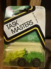 YATMING HONG KONG TRAFFIC STOPPERS TASK MASTERS TRACTOR SHOVEL, MINT ON CARD