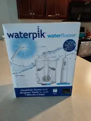 Waterpik Water Flosser Cordless NIB Model WP-150W (5 TIPS)