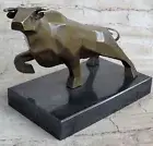 ART DECO HOTCAST BRONZE BULL MOUNTED ON A BLACK MARBLE BASE. SIGNED NICK DECOR