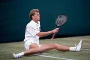 Stefan Edberg of Sweden after falling during the Stella Artois Cha- Old Photo