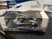 1/43 Craig Lowndes/ Glen Seton 2003 Bathurst BA Falcon low COA