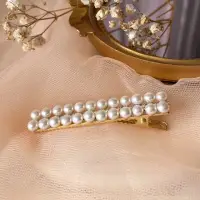 在飛比找momo購物網優惠-【Elegant 珍愛宣言】氣質韓版天然珍珠髮夾(珍珠髮飾)
