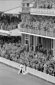 Greg Chappell of Australia returns to the pavilion to a stan - Cricket Old Photo