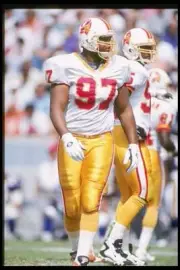Defensive lineman Tyoka Jackson Tampa Bay Buccaneers looks on d- 1996 Old Photo
