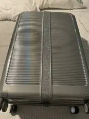 Samsonite Silver/Chrome Sarah Jessica Parker Expandable Spinner luggage 28” $700
