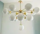 Mid-Century Modern Sputnik Chandelier with Brass Finish and White Glass Globes